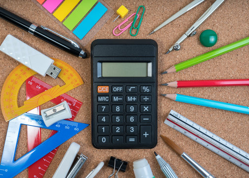 Stationery of education for mathematics class in school. Mathematics equipment and mathematics tools for basic math with calculator in the center.