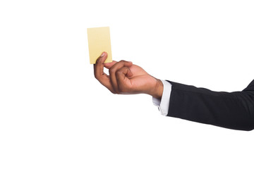 Close-up of black male hand in suit holding blank credit or debit card