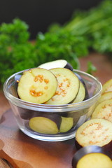 Sliced eggplant in a bowl © lisa870