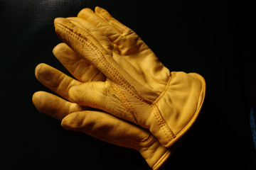 Yellow leather gloves