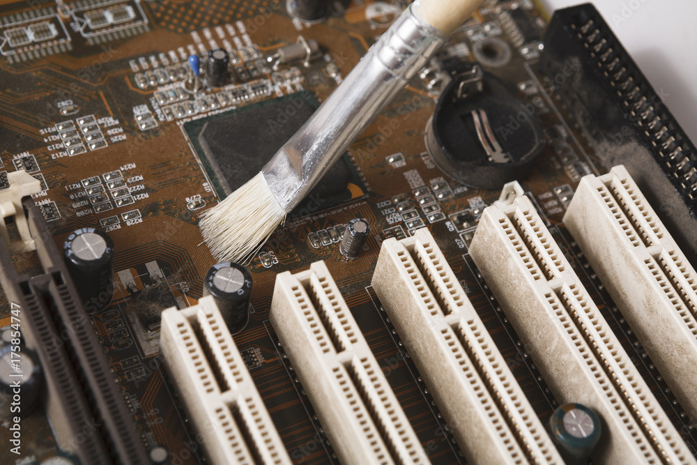 Poster Cleaning computer components close up
