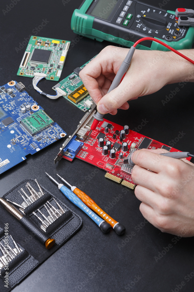 Poster electronic circuit red board inspecting close up