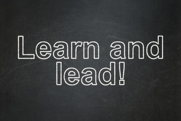 Obraz premium Learning concept: Learn and Lead! on chalkboard background