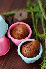 Delicious chocolate cupcakes with cinnamon on the table