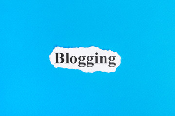 Blogging text on paper. Word Blogging on torn paper. Concept Image
