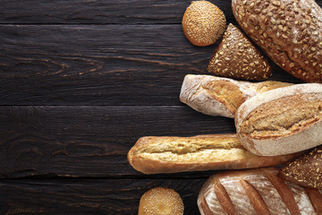 Bakery background, bread assortment on black