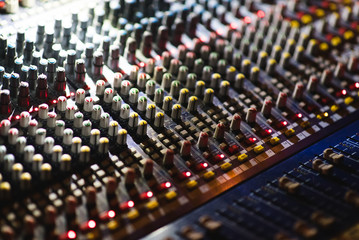 Close up footage of audio mixer. Sound control panel at concert