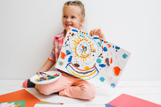 Happy Childhood. Baby Girl Artist. Creative Entertainment, Early Children Education. Smiley Kid With Paint Artwork On White Background, Creativity Concept