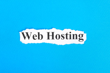 web hosting text on paper. Word web hosting on torn paper. Concept Image