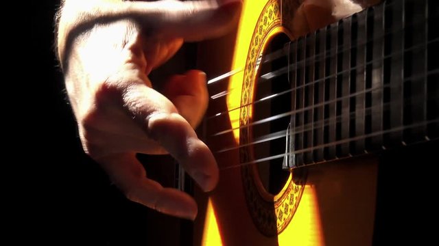 hand playing Spanish guitar