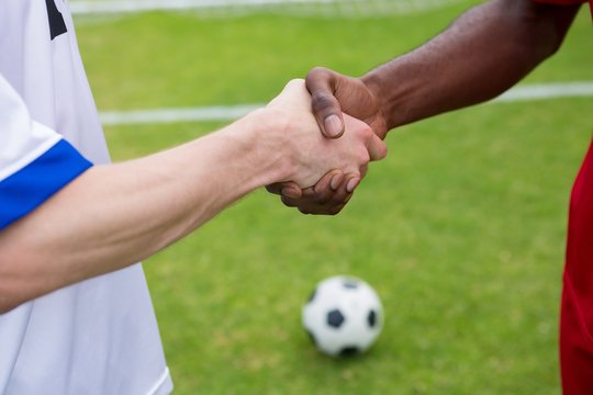 Cropped image of soccer player doing handshake