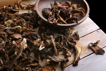 Dried and sliced edible mushrooms. Heap of natural dried sliced boletus mushrooms. Hand-picked in forest.
