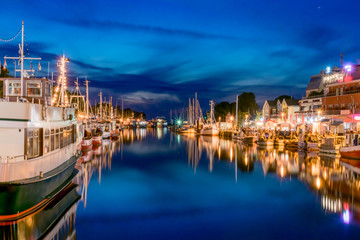 night view of canal with ships and Baltic Sea in Warnemunde, Rostock Germany