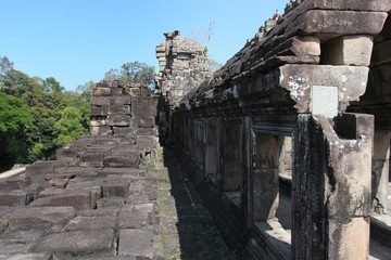 Ruins and walls of an ancient city in Angkor complex, near the ancient capital of Cambodia - Siem Reap