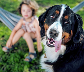 Cute little girl with her lovely dog friend