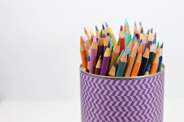color pencils in tin can