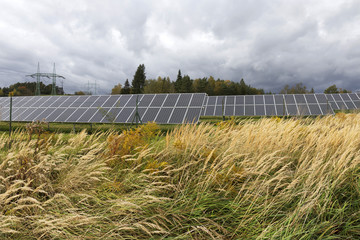 Solar Power Station on the autumn Meadow 