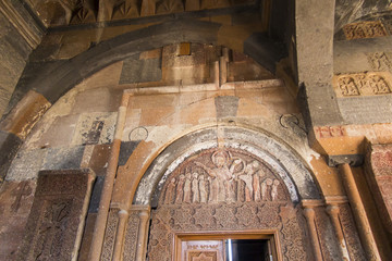 Ohanavan, Armenia, September 15, 2017: Part of the wall with ornaments in the monastery in Hovhannavank. - obrazy, fototapety, plakaty