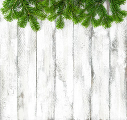 Christmas tree branches wooden  background Winter holidays