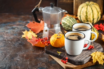 Coffee cups and pumpkins