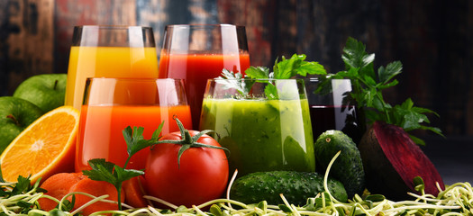 Glasses with fresh organic vegetable and fruit juices