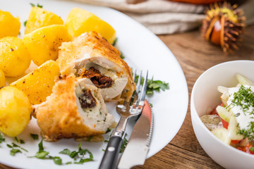 Chicken breast stuffed with cheese and dried tomatoes.