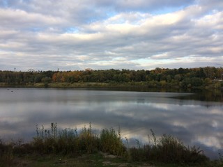 Fototapeta na wymiar Colorful autumn day on lake, Ramenskoe, Moscow region