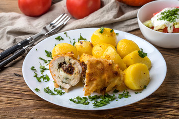 Chicken breast stuffed with cheese and dried tomatoes.