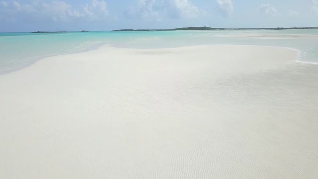 idyllic shore beach with cristall clear water and white sand