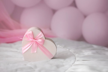 Fototapeta na wymiar Pink heart gift paper box