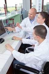Fototapeta premium students scientist doing experiments in lab