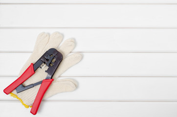 Tools on a white wooden background