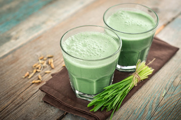 Two green barley grass shots