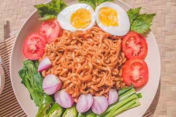 Delicious Fried Noodles on Unique Bamboo Woven Table 