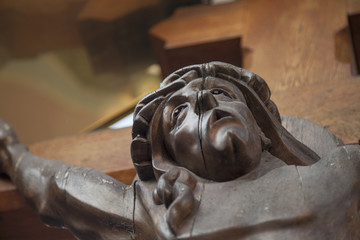 Jesus Christ crucified (Close up of an ancient wooden sculpture)