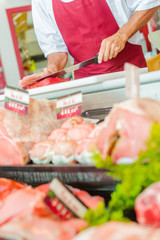 Cutting a piece of beef to order
