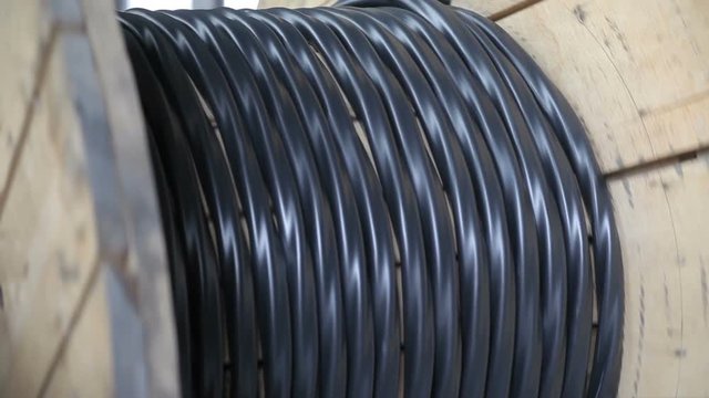 Winding of the electrical cable to the bobbin in the production