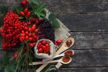Medicinal plants and herbs composition: Dog rose, bunch branch Rosehips, types Rosa canina hips, essential oil. bunch,  dried flowers of linden and chamomile elderberries and goji berries.  