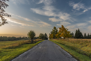 Evening with road in Slavkovsky les national park