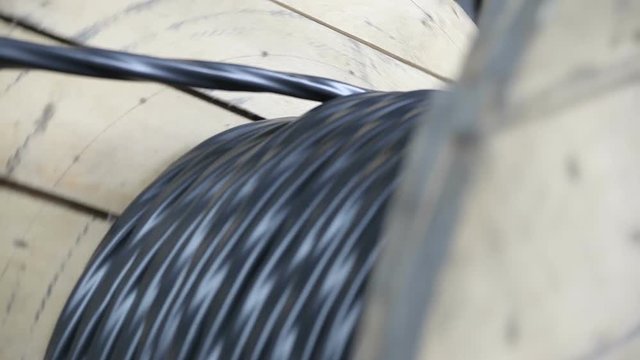 Winding of the electrical cable to the bobbin in the production