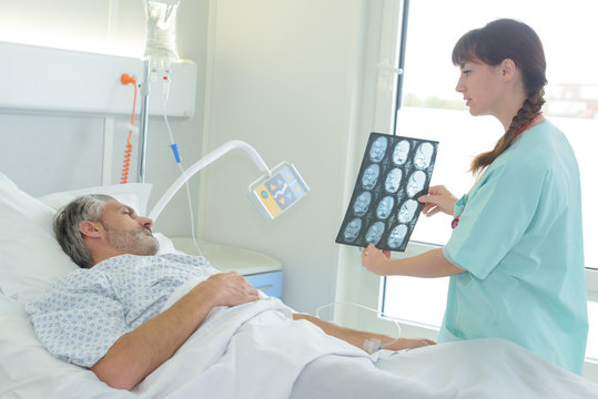 nurse showing the radiology result
