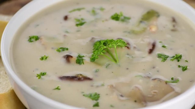 Homemade Porcini Soup (rotating) as detailed 4K UHD footage (seamless loopable)
