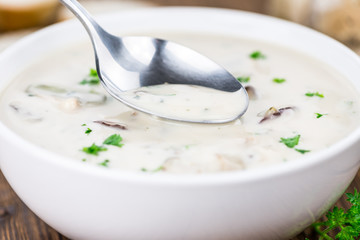 Fresh made Porcini Soup on a rustic background