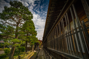 Narrow road with blue sky