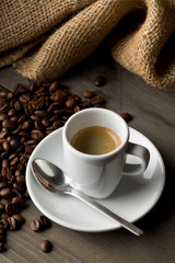 Coffee beans and cup of espresso
