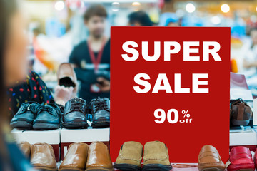 sale 90% off mock up advertise display frame setting over the men shoes shelf in the shopping department store for shopping, business fashion and advertisement concept