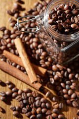 Aroma coffee chocolate cookies and spices on the wooden table. Dark wooden background. Top view. Close. Closeup.