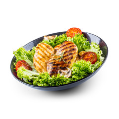Grill Chicken Breast. Roasted and grill chicken breast with lettuce salad tomatoes and mushrooms isolated on white