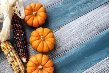 Pumpkins on wood surface