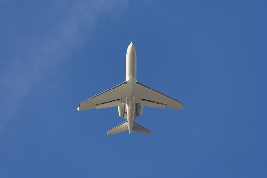 private jet airplane on blue sky composition photography